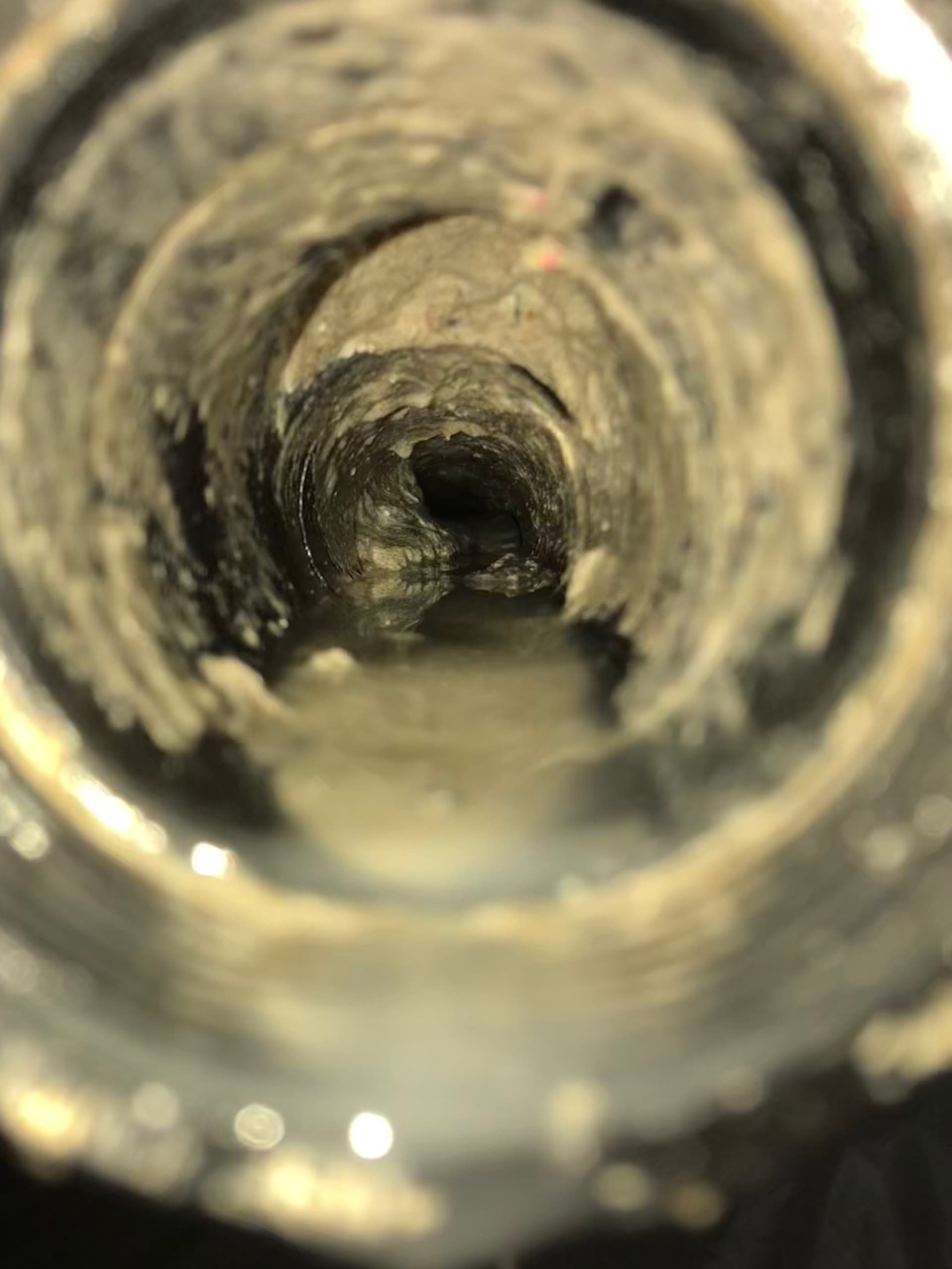 Cement Buildup Inside a Sewer Line Is No Small Problem image